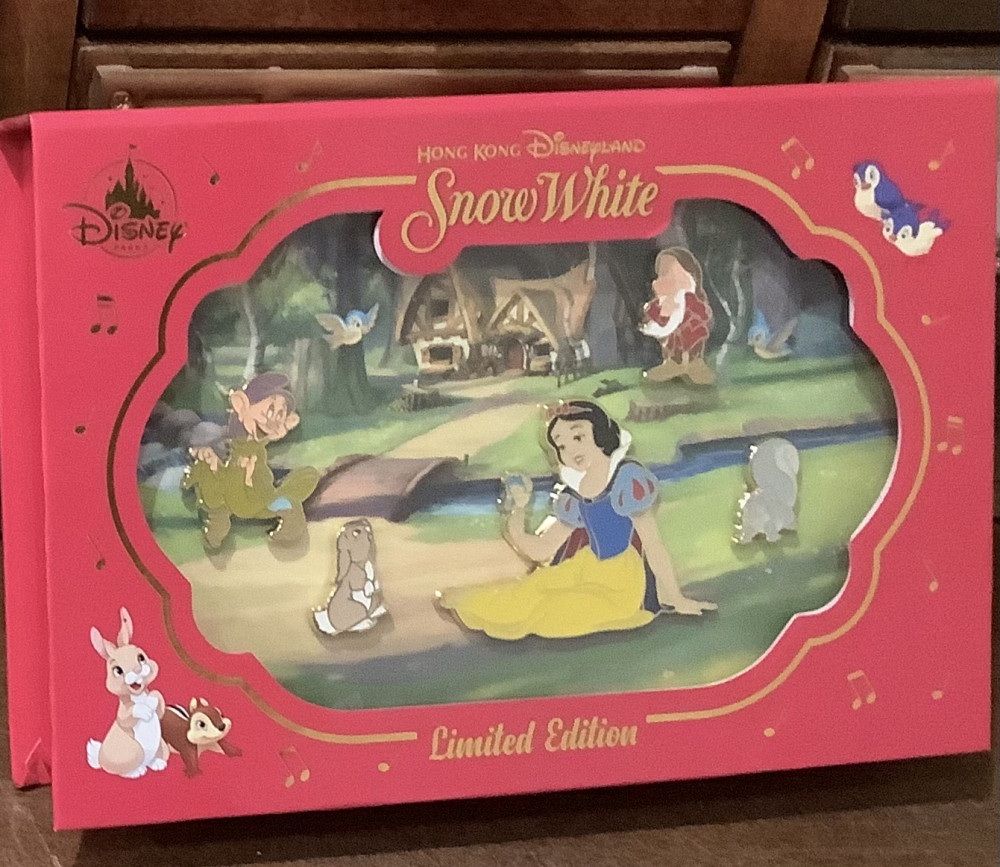 Snow White, Dopey, Grumpy, bunny, and squirrel