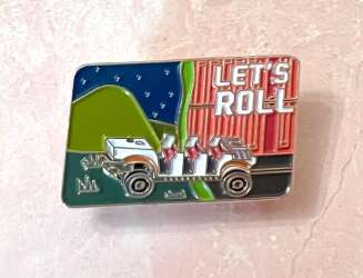 Let’s Roll Dinosaur Ride Pin