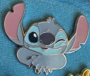 Stitch Crossing Arms and Winking