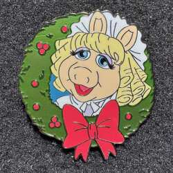 Miss Piggy as Mrs. Emily Cratchit
