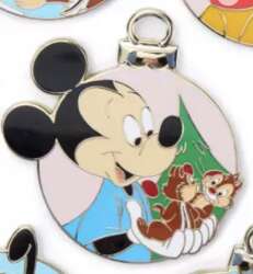 Mickey holding Chip and Dale