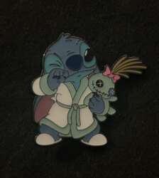 Stitch In A Robe Holding Scrump