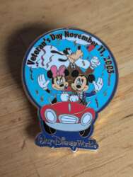 'Veteran's Day - Mickey, Minnie, and Goofy in a parade car - WDW'