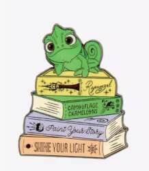 Pascal on Rapunzel Book Stack