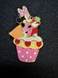 Minnie Mouse on Strawberry Cupcake
