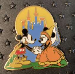 Cast exclusive princess Minnie and Mickey in front of castle