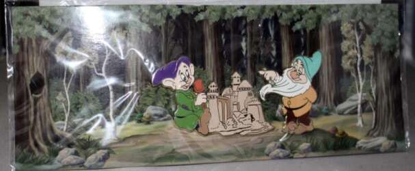 Dopey and Bashful Building a Sandcastle