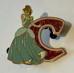 The letter "C" with Cinderella in blue dress