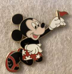 Young Mickey. Red and white swim trunks. Flip flops. Putting a flag