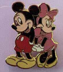 This pin captures a shy, endearing pose between Mickey and Minnie Mouse. Flip it over to find a gold waffle-impressed back marked "Limited Edition 3600"