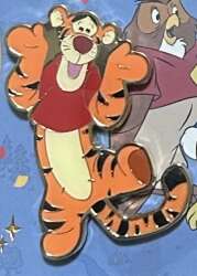 Tigger wearing Pooh's red shirt