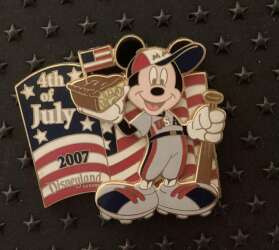 Mickey in baseball uniform with bat holding cake with a flag