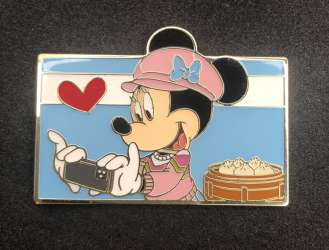 Minnie taking picture