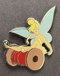 Spool of red thread / Tinker Bell