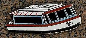 White with blue and red trim boat