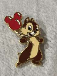 Chip holding a Red Balloon