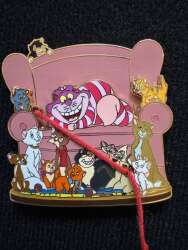 Disney Cats on armchair