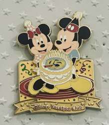 15 Years Mickey and Minnie Holding Cake