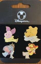 Winnie the Pooh, Tigger, Eeyore, and Piglet with scarves