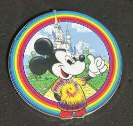 Mickey with Tie Dye in front of castle