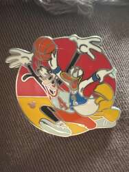 Goofy and Donald Playing Basketball